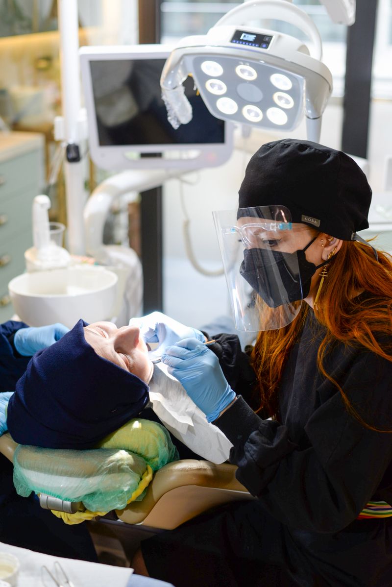 Dentist welcoming a patient at a dental clinic